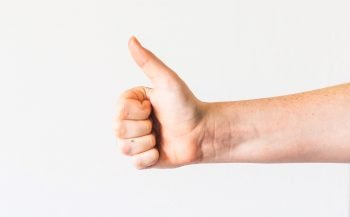 Picture of a thumbs up on a white background
