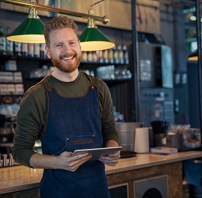 man-smiling-tablet